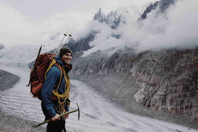 man standing near mountain