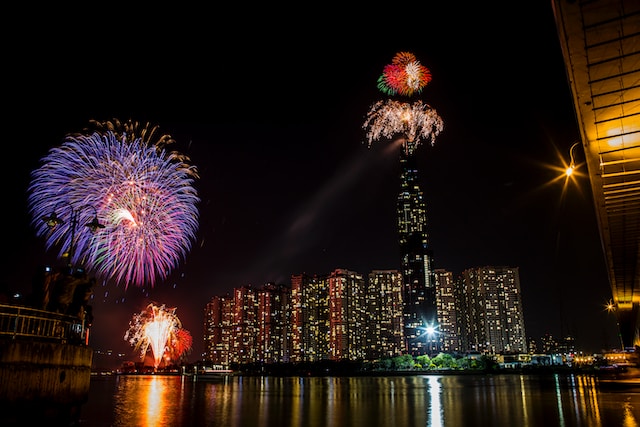 fireworks display over city buildings