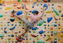 World Practice of Insurance for Athletes person doing rock climbing