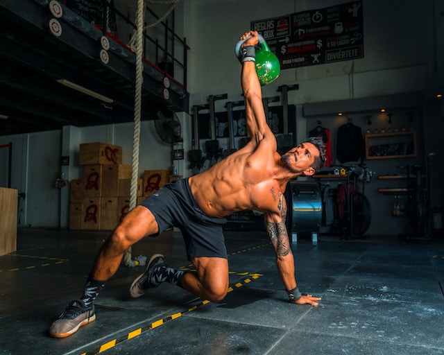 person making push up of gear