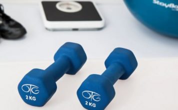 Creating Your Perfect Home Gym: a Comprehensive Guide Home Gym - Two 2 Kg. Blue Hex Dumbbells on White Surface