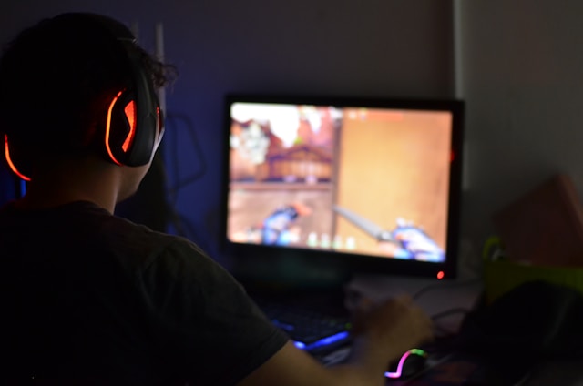 a-man-wearing-headphones-playing-a-video-game